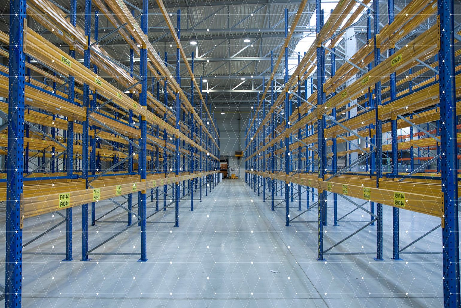 A large warehouse filled with lots of shelves and racks.