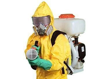 Man Wearing Suit For Disinfecting — Atlanta, GA — Cleanstar National, Inc. Man Wearing Suit For Disinfecting — Atlanta, GA — Cleanstar National, Inc.