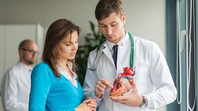 Doctor Explaining Heart Problem — Big Spring, TX — Shroff Cardiology & Internal Medicine Clinic PA Doctor Explaining Heart Problem — Big Spring, TX — Shroff Cardiology & Internal Medicine Clinic PA