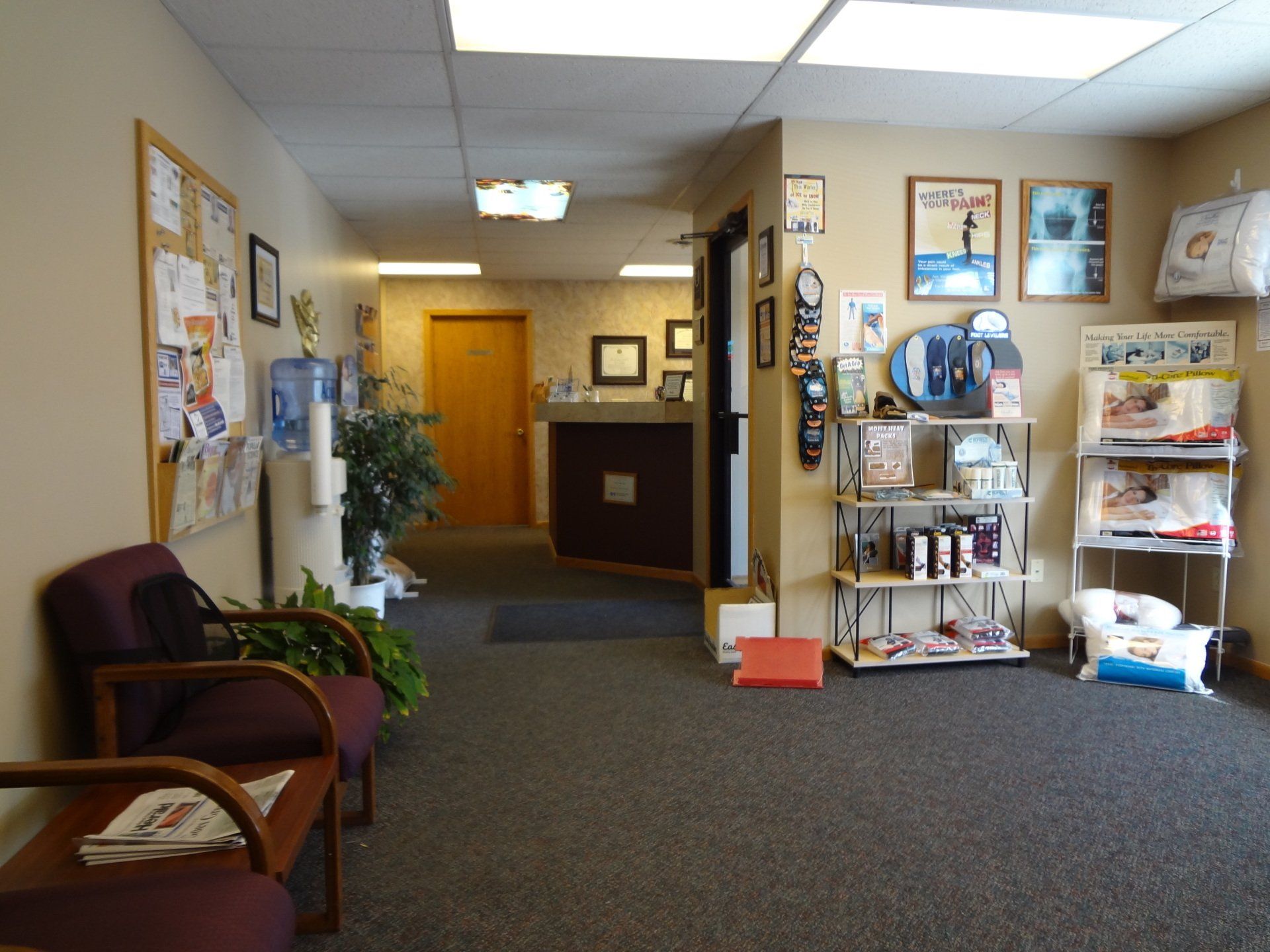 Chiropractor Showing the Spine Model to Patient — Grand Forks, ND — ChiroCenter One