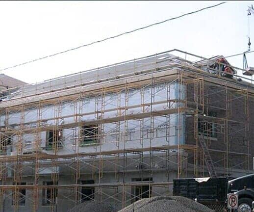 House with Scaffolding — Hillsdale, MI — Braman Roofing