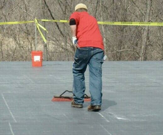 Worker Working on Roof — Hillsdale, MI — Braman Roofing