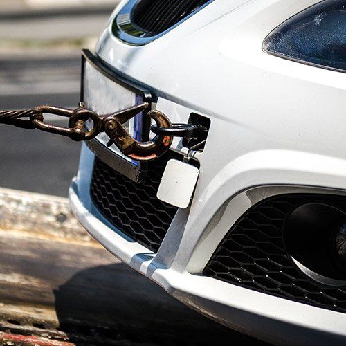 Towing Service — White Car Being Tow in Canoga Park, CA Towing Service — White Car Being Tow in Canoga Park, CA