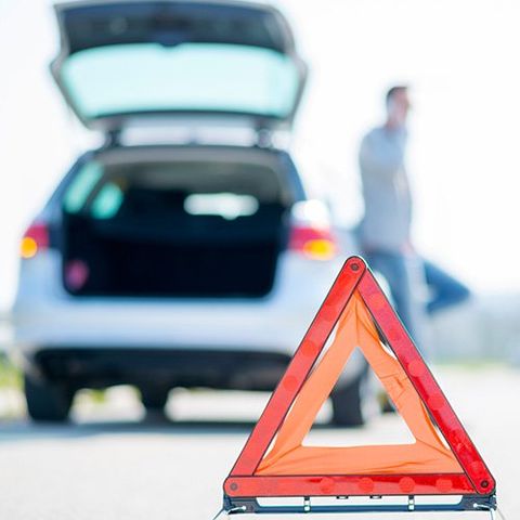Emergency Towing Service — Man Calling for Help in Canoga Park, CA Emergency Towing Service — Man Calling for Help in Canoga Park, CA