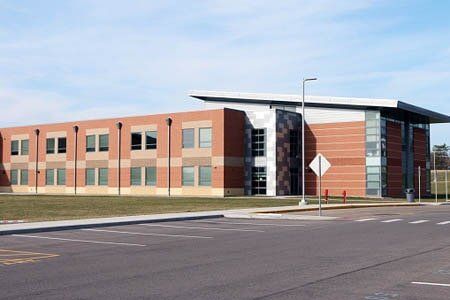 School Asphalt Parking Lot — Community Asphalt Paving Contractor in TX School Asphalt Parking Lot — Community Asphalt Paving Contractor in TX