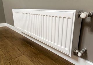 HVAC — White Heating Radiator on Wall in Andover, NJ HVAC — White Heating Radiator on Wall in Andover, NJ