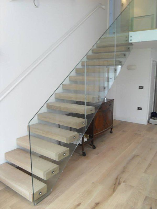 staircase with glass railing