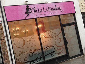 Shop sign with digitally printed and black acrylic graphics