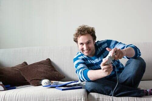 Man Playing Game — Electronics in Kent, WA