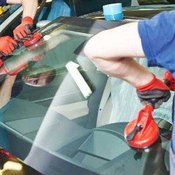 Replacement Auto Glass  — Crew Replacing Car Windshield in St. Louis, MO