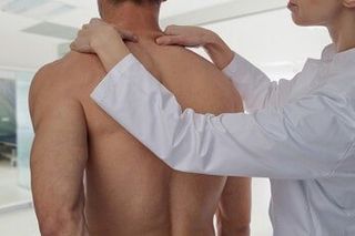 Acupressure, Man having chiropractic back adjustment — Chiropractic in Los Angeles, CA Acupressure, Man having chiropractic back adjustment — Chiropractic in Los Angeles, CA