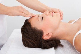 Woman receiving a massage while lying down — Chiropractic in Los Angeles, CA Woman receiving a massage while lying down — Chiropractic in Los Angeles, CA
