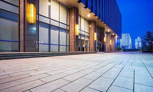 Residential Glass — Commercial Building at Night in Panama City Beach, FL