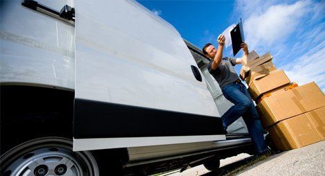 A man getting out of the van