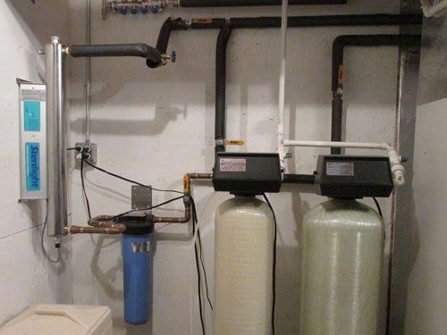 The ideal Town Water System should consist of; From right to left; A Granular Activated Carbon Filter for Chlorine, Rust and other Organics, a Water Softener and an Ultra-Violet Light Disinfection System