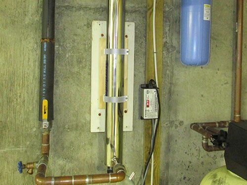 An Ultra-Violet Light Disinfection System with its attendant Big-Blue Sediment Pre-filter
