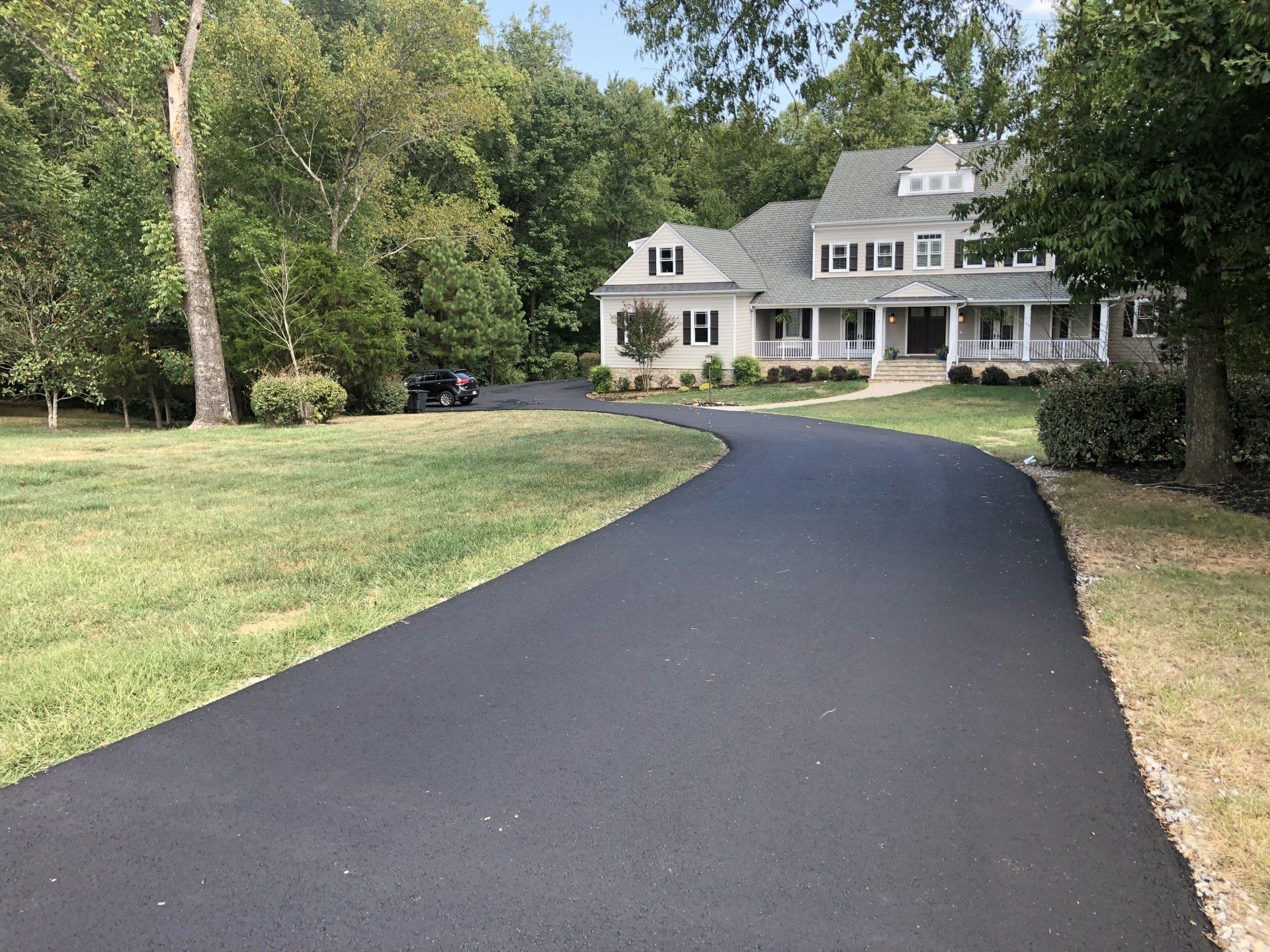 Blacktop driveway - Driveway Maintenance in Manakin Sabot, VA