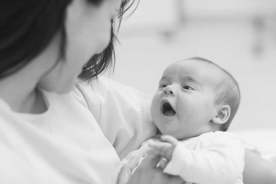 happy newborn baby - Heavenly Hands Birthing Center