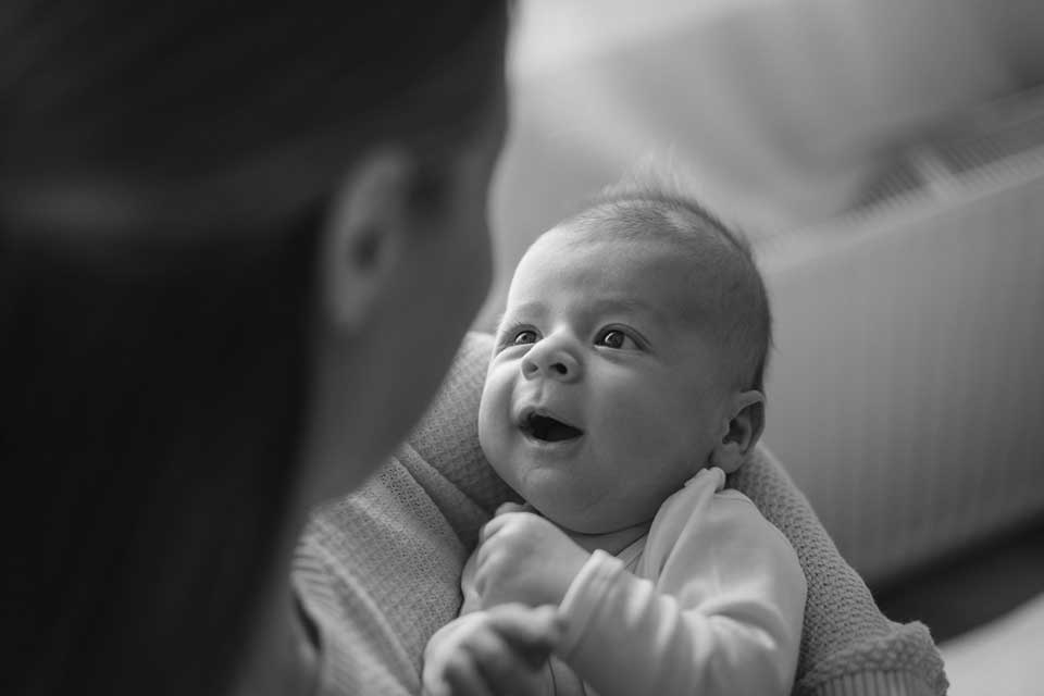 newborn baby looking at mother - Heavenly Hands Birthing Center