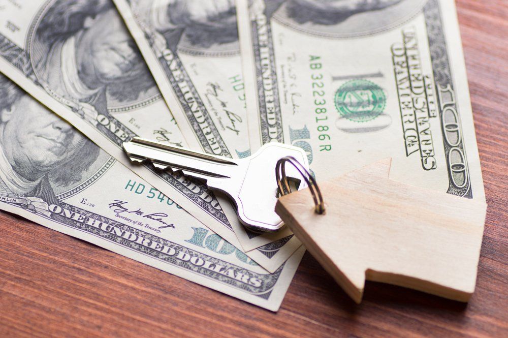 Money With Key Over — Fowler, CO — Total Concept
