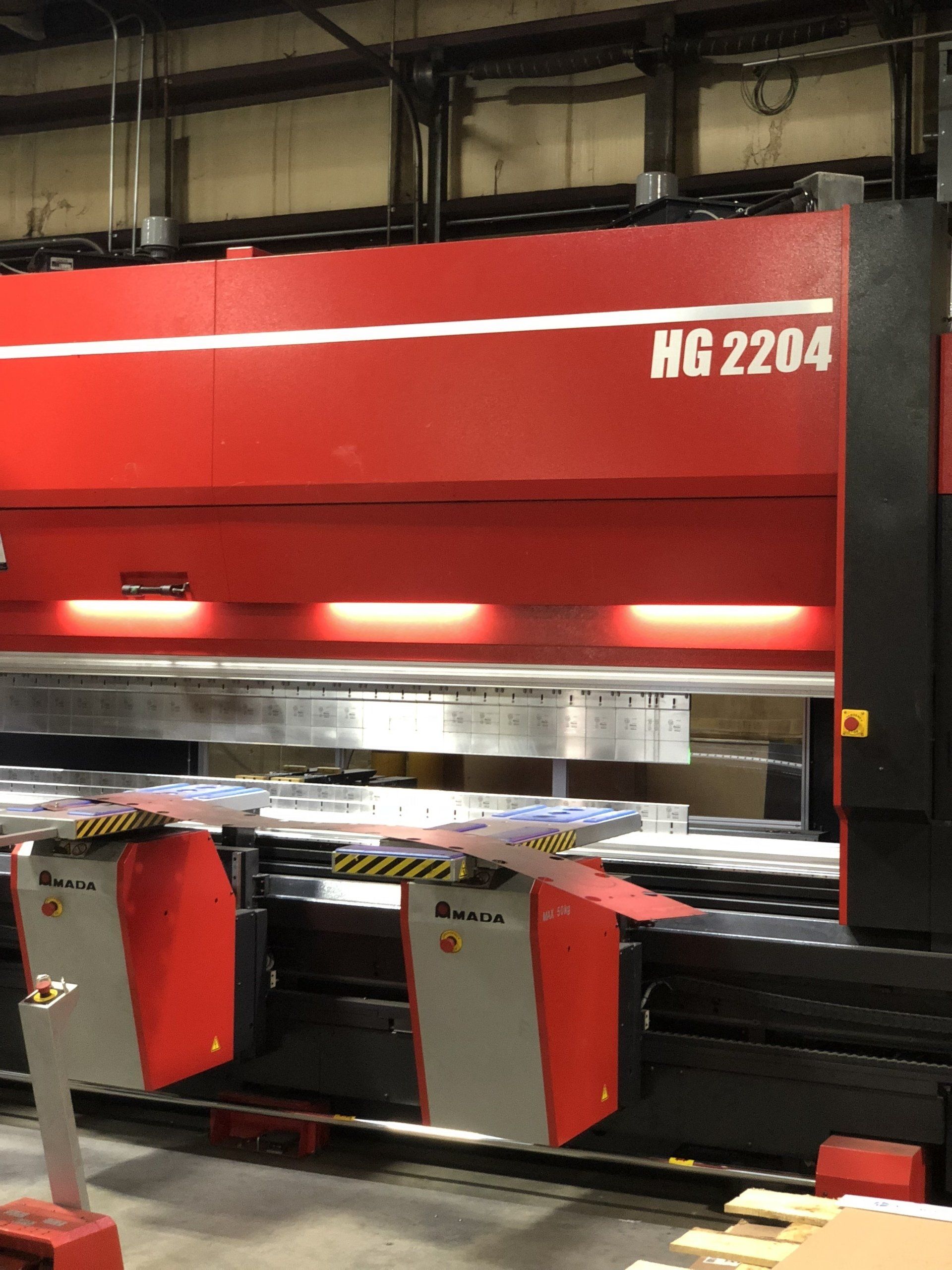 A red machine with hg2204 written on it