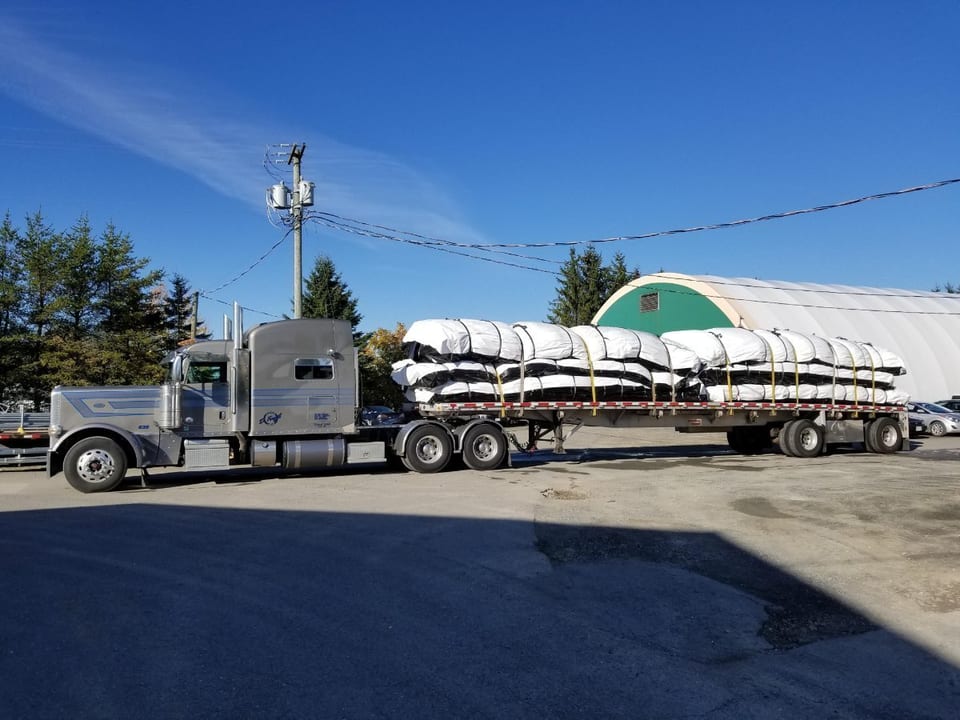 Cover-Tech custom made insulated tarps being used to cure concrete in Muskrat Falls Project