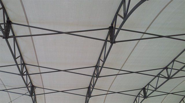 COVER-TECH INC. X-BRACE PURLINS ON FABRIC BUILDING FRAME STRUCTURE
