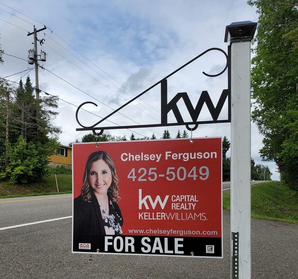 A for sale sign for chelsea ferguson 425-5049