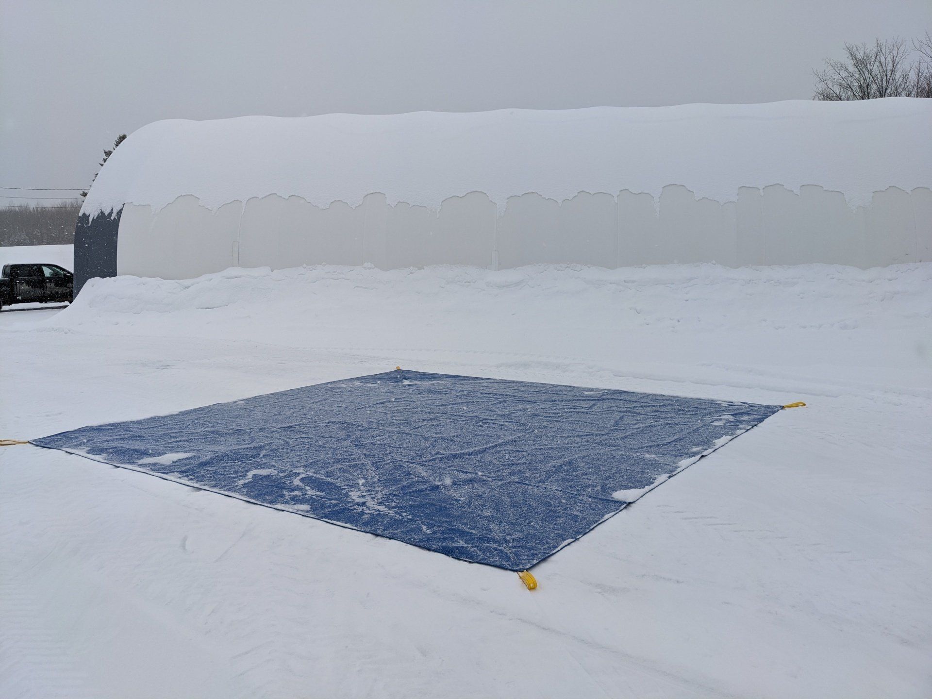Construction tarps for snow removal