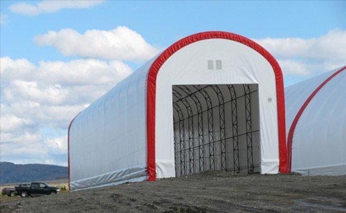 cover-tech inc. 22' x 120' with 14' high side covering scales STRAIGHT WALL FABRIC BUILDINGS