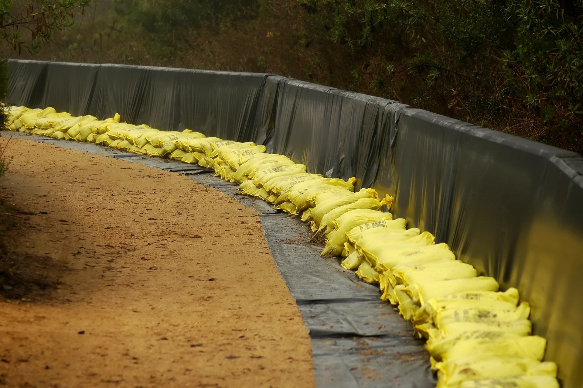 COVER-TECH dam fabric and flood control sand bags