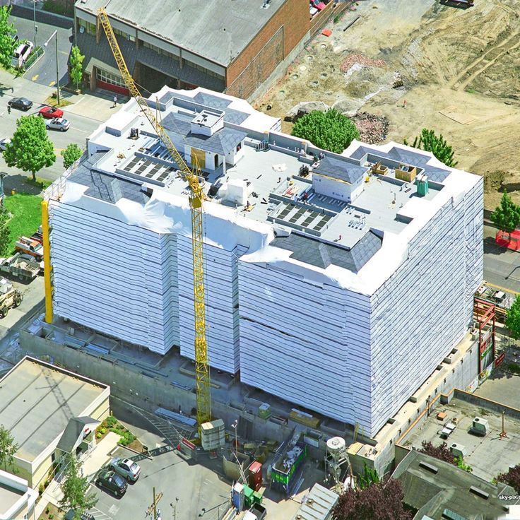 COVER-TECH INC. SCAFFOLD SHEETING AND INSULATED TARPS TOLL FREE 1-888-325-5757