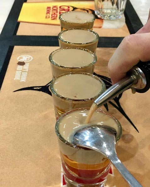 coffee being poured into a glass