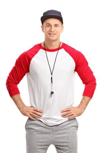A man in a red and white Coach uniform