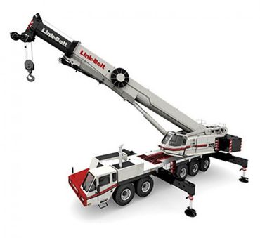 Link-Belt mobile crane, white and red, boom extended, resting on outriggers.