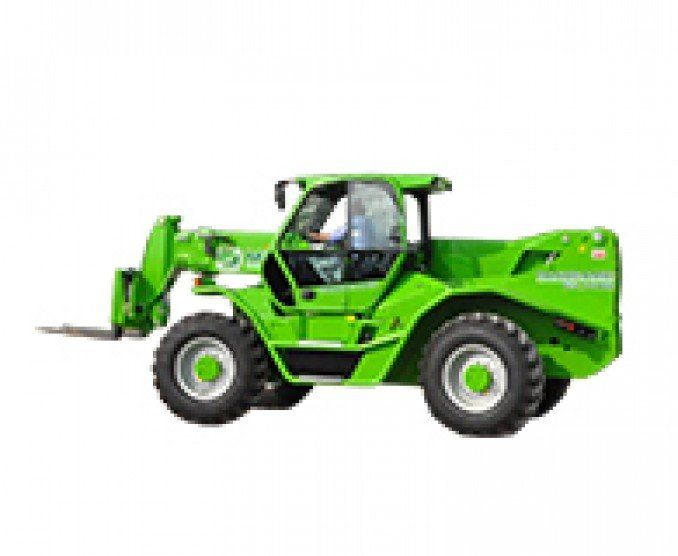 Green telehandler with forks, outdoors.