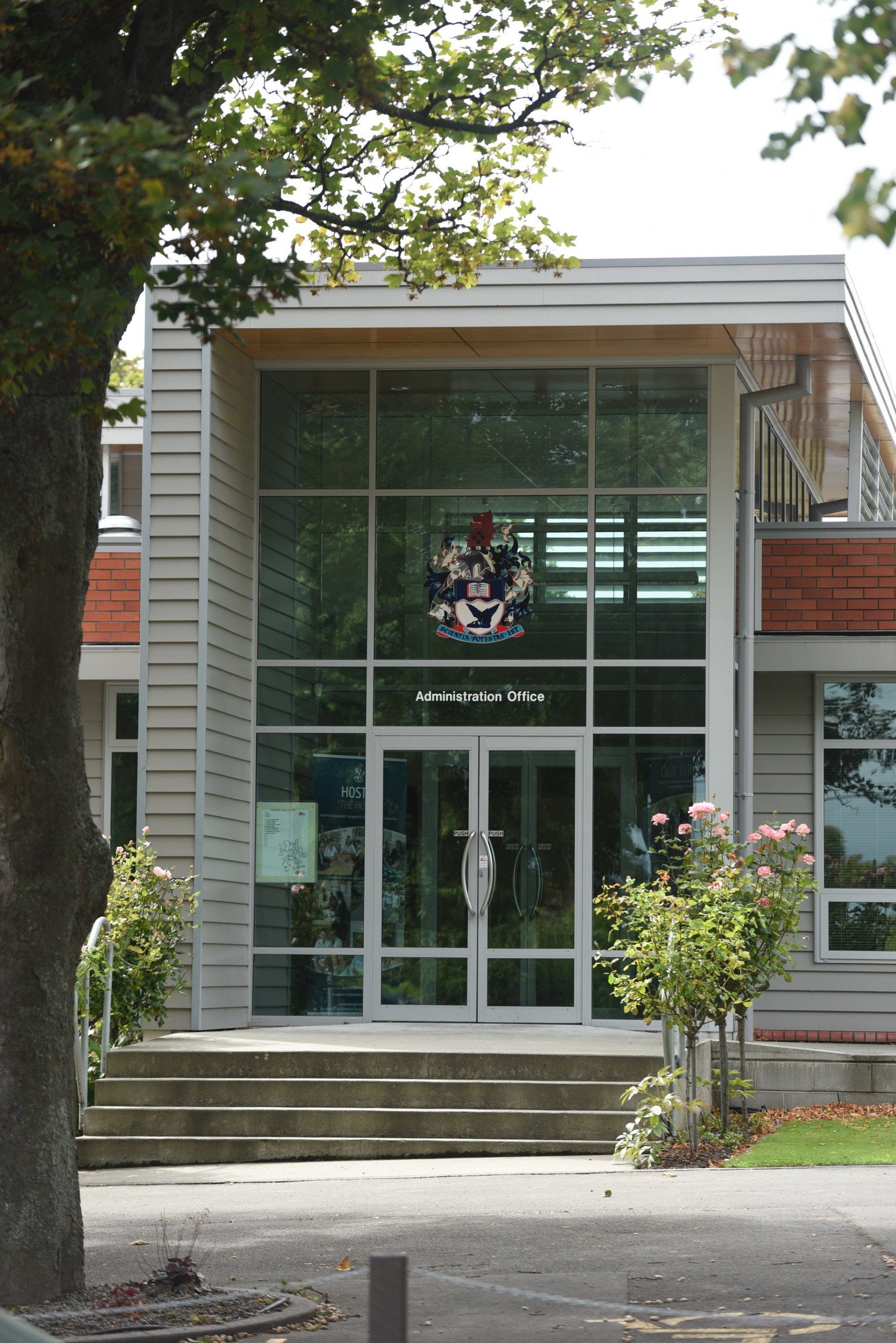 A large building with a tree in front of it