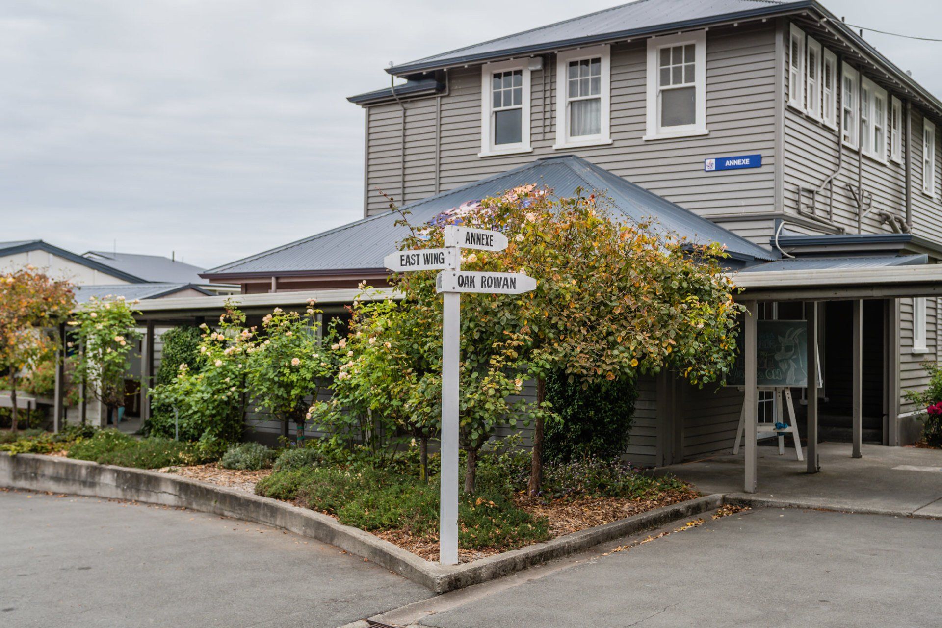 Timaru Girls Hig School | A large house with a sign in front of it.