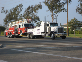 Car being loaded in tow truck - Truck towing in Oxnard, California