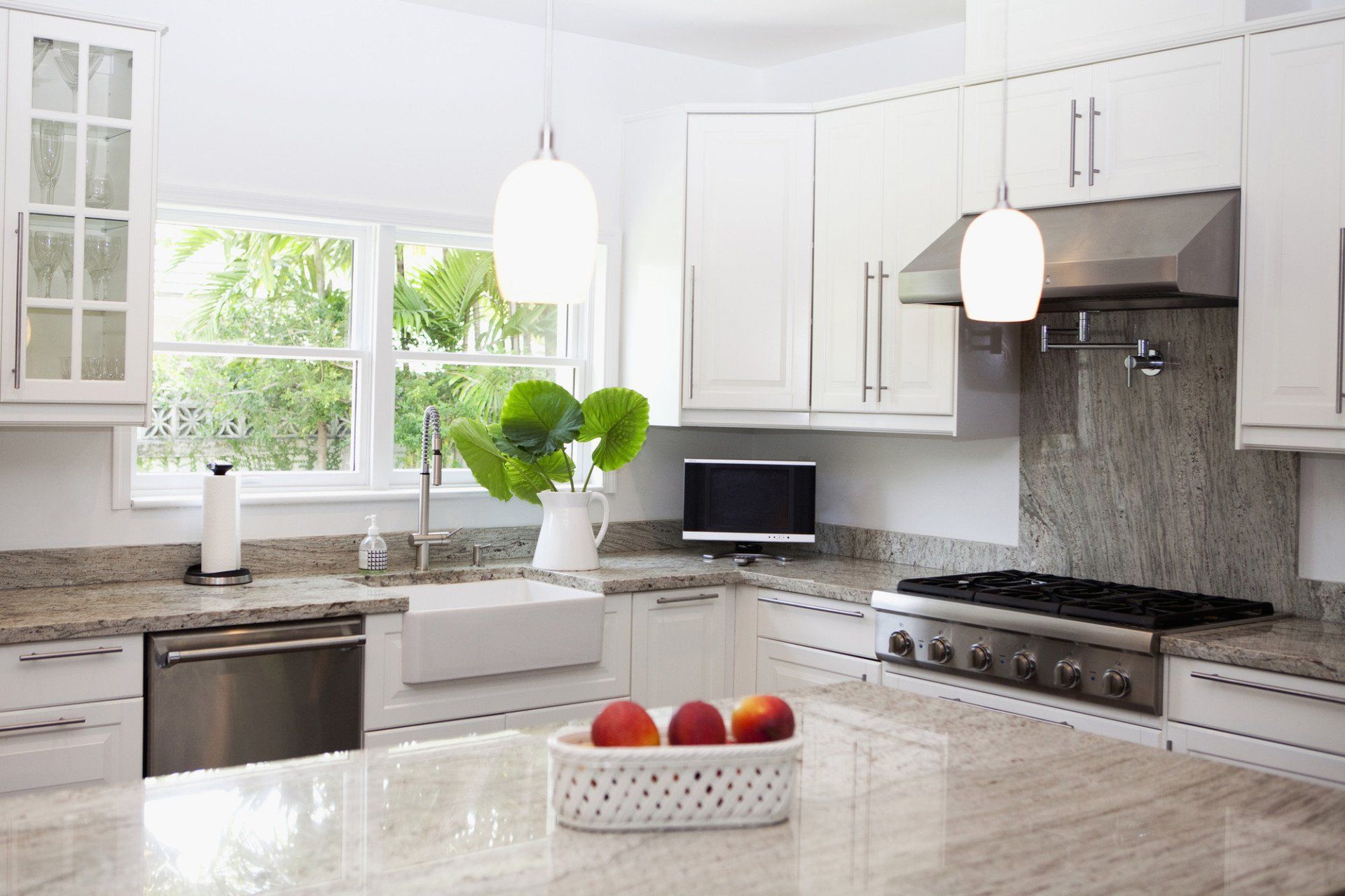 Counter, stove and sink in modern kitchen