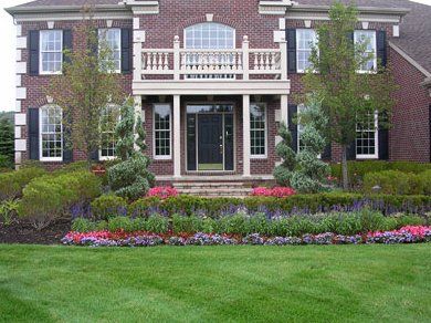 Professional Landscape Design — Newly Mowed Turf with Beautiful Flowers in Troy, MI