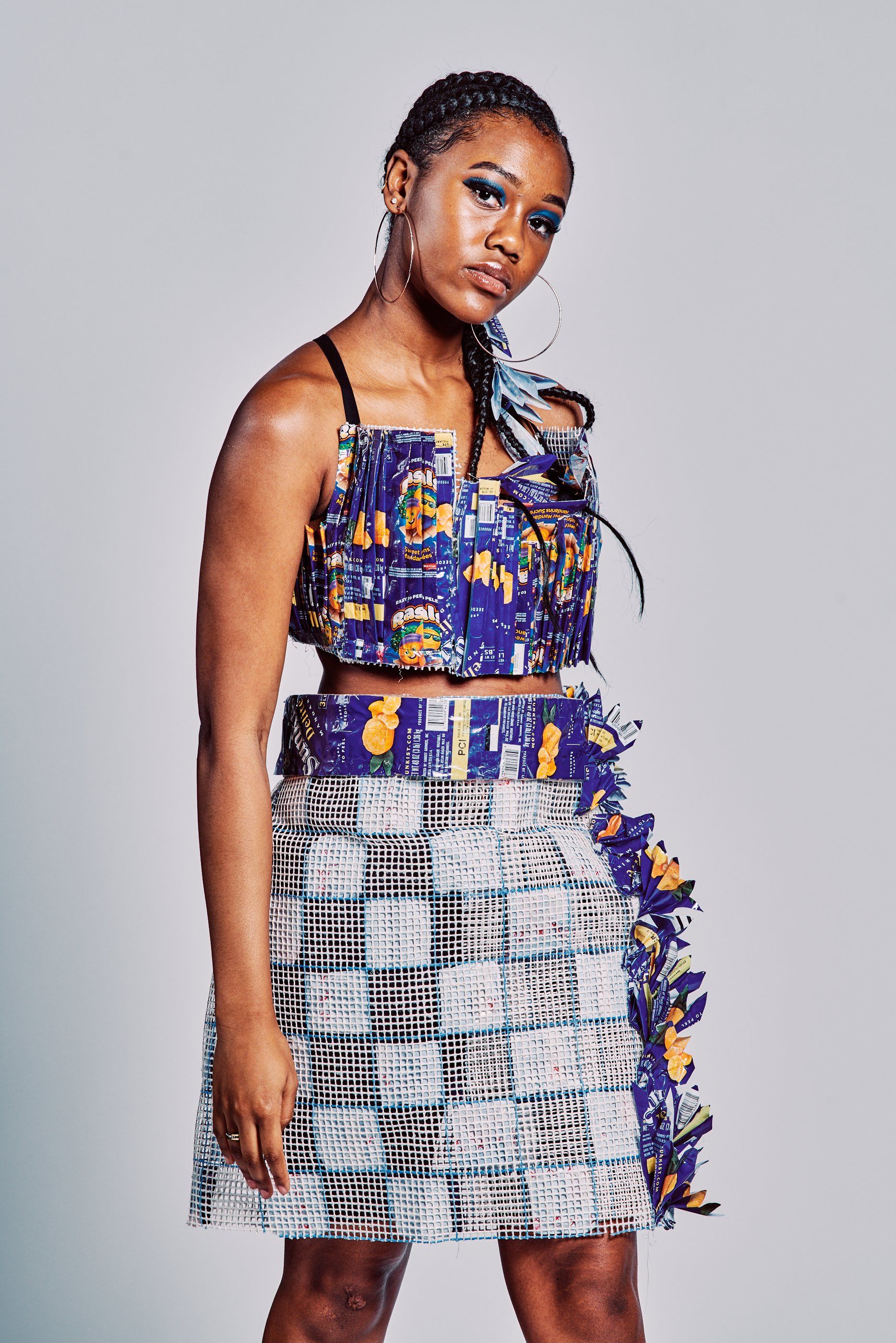 Model in hand-made garment at the 2019 Sustainable Fashion Show at New Design High School
