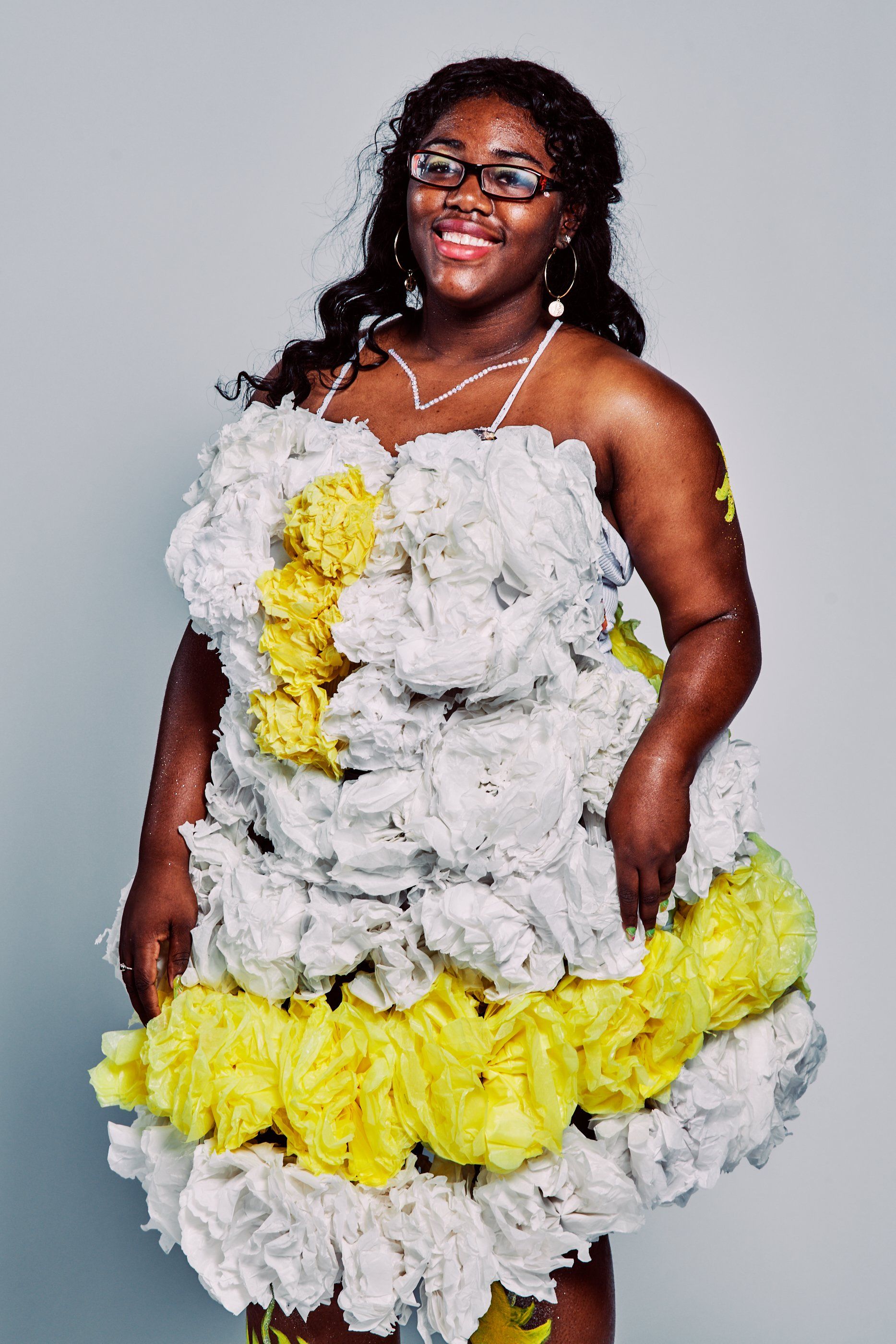 Model in hand-made garment at the 2019 Sustainable Fashion Show at New Design High School