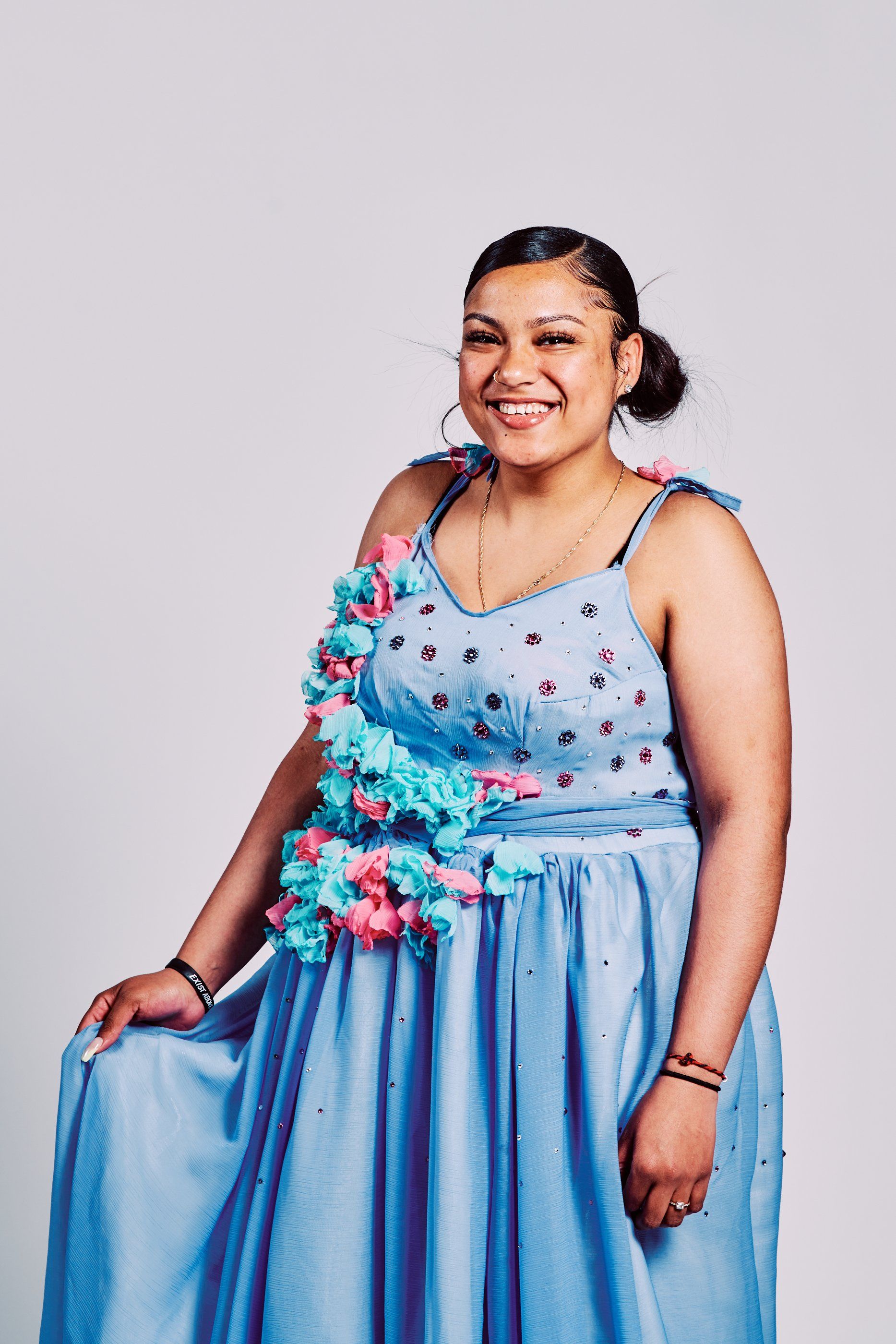 Model in hand-made garment at the 2019 Sustainable Fashion Show at New Design High School
