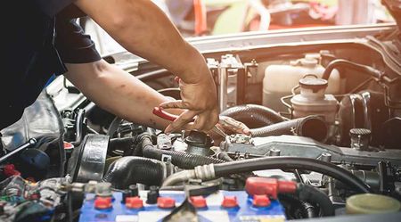 Mechanic working on car — Auto Repair in Rockhampton, QLD Mechanic working on car — Auto Repair in Rockhampton, QLD
