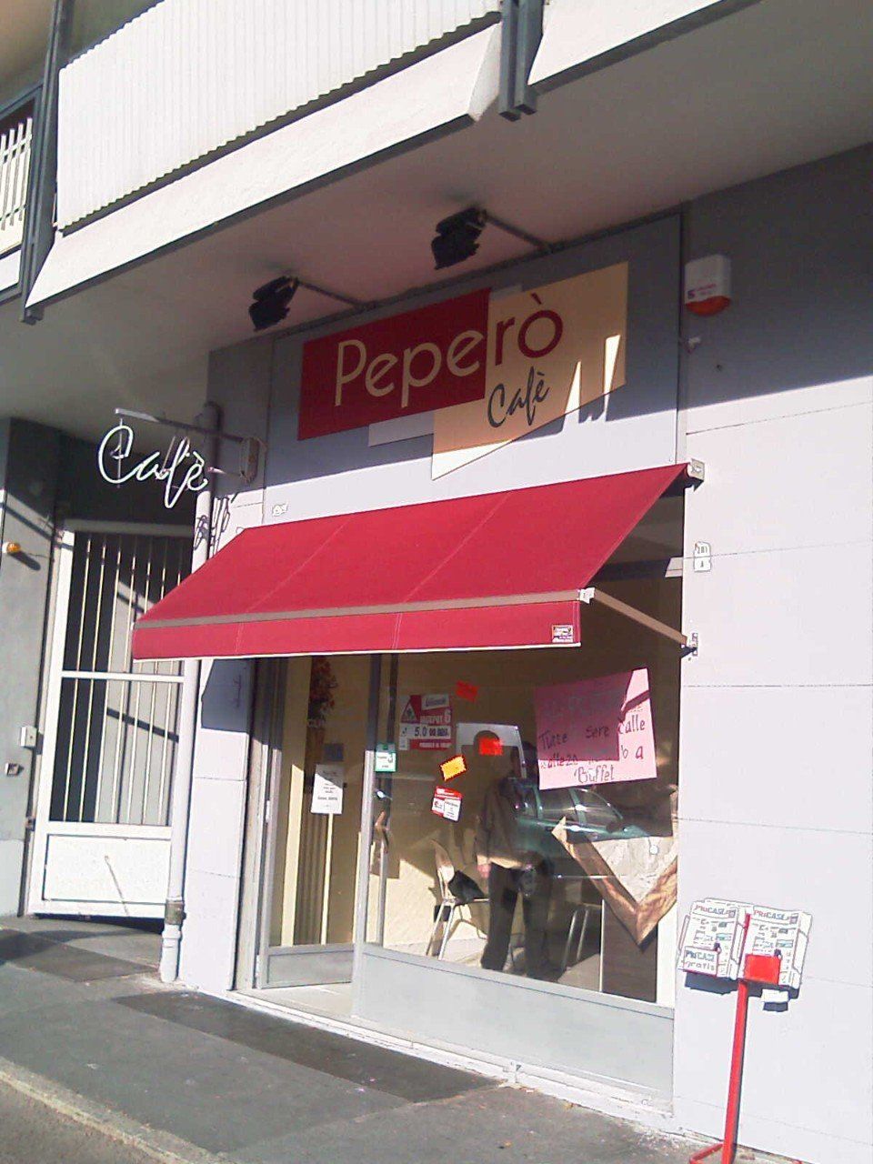 Tende alla pantalera rosse per bar