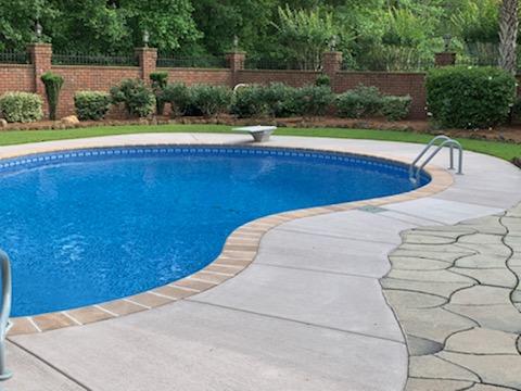 inground pool with diving board