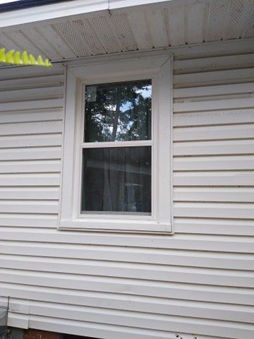 white vinyl window replacement for a ranch home