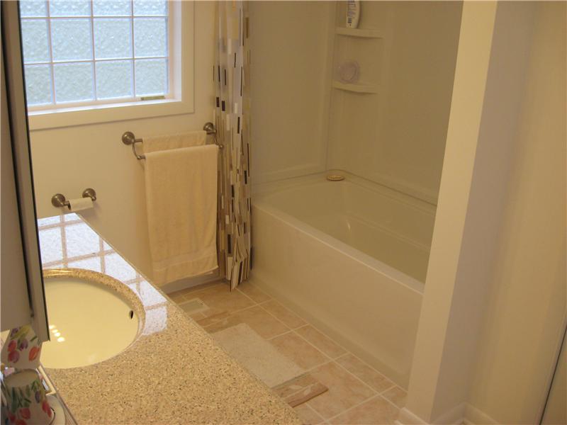 White Tub and Sink Before Bathroom Remodel | Bathroom Remodel | Fayetteville, NC