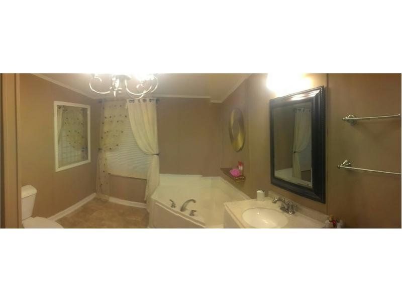Bathroom with Corner Jacuzzi Tub Before Bathroom Remodel | Bathroom Remodel | Fayetteville, NC